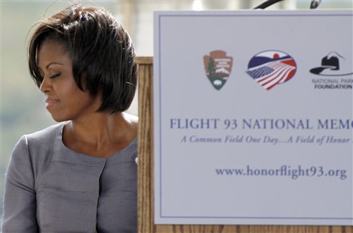 
 First lady Michelle Obama listens to a choral selection before speaking during a commemorative service at the temporary Flight 93 memorial in Shanksville, Pa., Saturday, Sept. 11, 2010. (AP Photo/Gene J. Puskar)
 