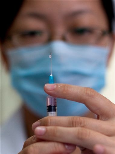 
 A nurse prepares a vaccine shot against measles at a clinic in Beijing, China, Saturday, Sept. 11, 2010. China wants to vaccinate nearly 100 million children in a 10-day nationwide campaign starting Saturday to bring it a step closer to eradicating measles. (AP Photo/Alexander F. Yuan)
 
