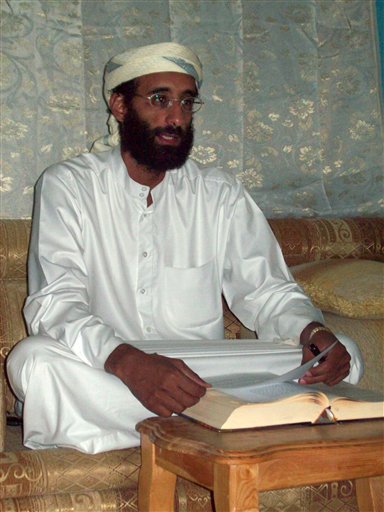 
 FILE - This October 2008 file photo by Muhammad ud-Deen shows Imam Anwar al-Awlaki in Yemen. The Obama administration is considering filing the first criminal charges against radical cleric Anwar al-Awlaki in case the CIA fails to kill him and he's is captured alive in Yemen. (AP Photo/Muhammad ud-Deen, File) MANDATORY CREDIT. NO SALES
 
