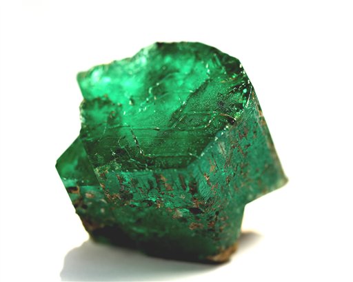 
 This undated handout photo provided by gemologist C.R. �Cap� Beesley shows the Carolina Emperor emerald mined by Terry Ledford and Renn Adams in Hiddenite, N.C., prior to any cutting. Gem experts say the emerald yielded at a North Carolina farm may be the biggest ever uncovered in North America. The 65-carat emerald nicknamed the Carolina Emperor was pulled from a farm in the rural community of Hiddenite, about 50 miles (80 kilometers) northwest of Charlotte.(AP Photo/C.R. 'Cap' Beesley) ** NO SALES ** (AP Photo/C.R. 'Cap' Beesley) NO SALES
 