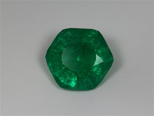 
 This undated photo provided by gemologist C.R. �Cap� Beesley shows the Carolina Emperor emerald after its final cut. Gem experts say the emerald yielded at a North Carolina farm may be the biggest ever uncovered in North America. The 65-carat emerald was pulled from a farm in the rural community of Hiddenite, about 50 miles (80 kilometers) northwest of Charlotte. (AP Photo/C.R. 'Cap' Beesley) ** NO SALES **
 