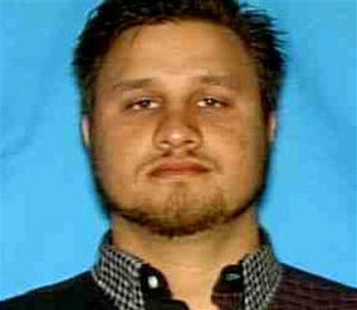
 This undated police image released by U.S. Attorney's Office shows Edgar Valdez Villarreal , alias 'the Barbie,' in an undisclosed location. Federal police on Monday, Aug. 30, 2010, captured Valdez Villarreal, a Texas-born alleged drug kingpin, who faces trafficking charges in the U.S. and has been blamed for a vicious turf war that has included bodies hung from bridges and shootouts in central Mexico. (AP Photo/US Attorney's Office)
 