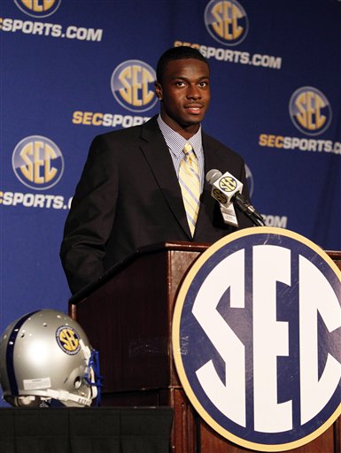 
 FILE - This July 22, 2010, file photo shows Georgia wide receiver A.J. Green talking to the media during the Southeastern Conference football media days, in Hoover, Ala. An NCAA committee hears an appeal, Friday Sept. 17, 2010, by Georgia receiver A.J. Green, who received a four-game suspension for selling his jersey to someone deemed an agent. If the committee sides with Green, he could be back on the field Saturday against No. 12 Arkansas. (AP Photo/ Butch Dill, File)
 
