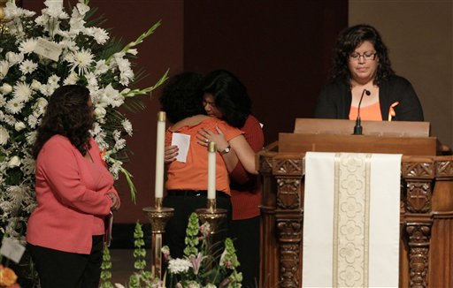 
 Friends of Jacqueline Greig are shown during a memorial service for Greig and her 13-year-old daughter Janessa, who were both killed in the San Bruno fire last week, at St. Cecilia Church in San Francisco, Thursday, Sept. 16, 2010. (AP Photo/Jeff Chiu)
 