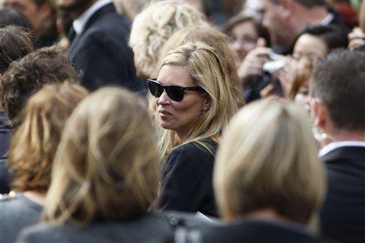 
 British supermodel Kate Moss after the memorial service for Alexander McQueen at St Paul's Cathedral in London, Monday, Sept. 20, 2010, which took place during London Fashion Week. (AP Photo/Sang Tan)
 