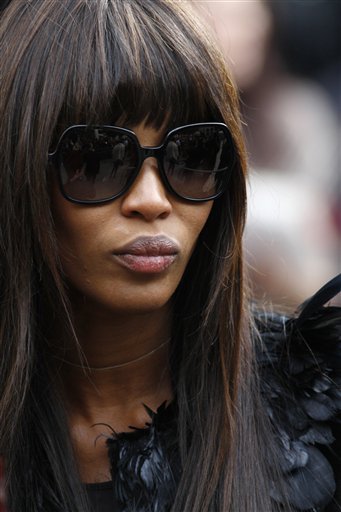 
 British supermodel Naomi Campbell leaves St Paul's Cathedral in London after the memorial service for Alexander McQueen at St Paul's Cathedral in London, Monday, Sept. 20, 2010, which took place during London Fashion Week. (AP Photo/Sang Tan)
 