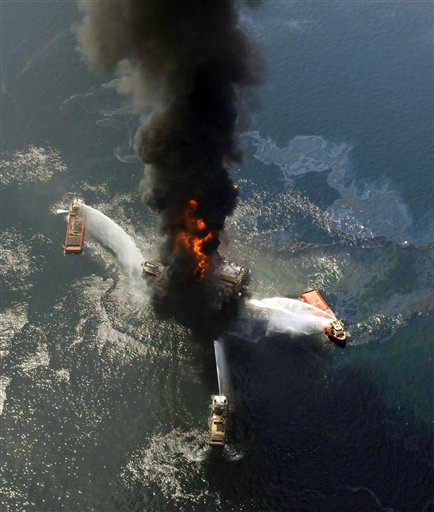 
 FILE - This April 21, 2010 file photo shows the Deepwater Horizon oil rig burning after an explosion in the Gulf of Mexico, off the southeast tip of Louisiana. Retired Coast Guard Adm. Thad Allen, the federal government's point man on the disaster, said Sunday, Sept. 19, 2010, BP's well 'is effectively dead.' A permanent cement plug sealed BP's well nearly 2.5 miles below the sea floor in the Gulf of Mexico, five agonizing months after an explosion sank a drilling rig and led to the worst offshore oil spill in U.S. history. (AP Photo/Gerald Herbert, File)
 