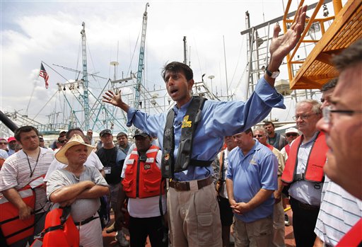 
 FILE - In this June 15, 2010 file photo, Louisiana Gov. Bobby Jindal speaks to local fishermen hired to deploy booms to collect oil as he tours impacted areas in the northern shores of Barataria Bay in Plaquemines Parish, La. Retired Coast Guard Adm. Thad Allen, the federal government's point man on the disaster, said Sunday, Sept. 19, 2010, BP's well 'is effectively dead.' A permanent cement plug sealed BP's well nearly 2.5 miles below the sea floor in the Gulf of Mexico, five agonizing months after an explosion sank a drilling rig and led to the worst offshore oil spill in U.S. history. (AP Photo/Gerald Herbert, File)
 