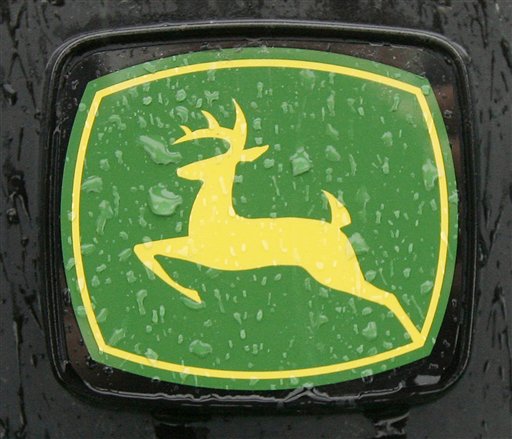 
 FILE - In this Nov. 25, 2008 file photograph, a John Deere logo is seen on a tractor at Harvest Equipment in Montpelier, Vt. Deere & Co. will sell its wind energy business to a subsidiary of Exelon Corp. for $900 million, the company said Tuesday, Aug. 31, 2010, potentially signaling an active merger and acquisition period ahead for the power industry. (AP Photo/Toby Talbot, file)
 