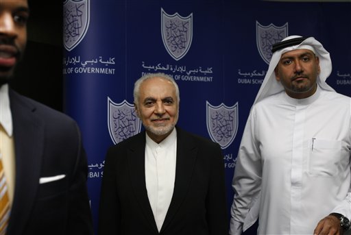 
 Imam Feisal Abdul Rauf, middle,is received by officials of the Dubai School of Government during an Iftar ceremony hosts by Dubai School of Government in Dubai, United Arab Emirates,Tuesday, Aug. 31, 2010. (AP Photo/Kamran Jebreili)
 