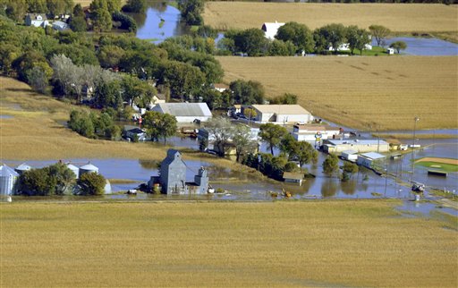 
 Water that overflowed from the Big Sioux River sits in the town of Renner, S.D., in this aerial photograph from Sunday, Sept. 26, 2010. (AP Photo/Dirk Lammers)
 