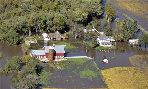 
 Flood waters surrounding a farm near Renner, S.D., are shown in this aerial photograph from Sunday, Sept. 26, 2010. Dozens of homes flooded after the Big Sioux River overflowed. (AP Photo/Dirk Lammers)
 