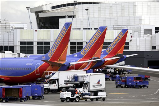 
 FILE - In this file photo taken June 7, 2010, Southwest Airlines planes are shown at Seattle-Tacoma International Airport in Seattle. (AP Photo/Ted S. Warren, File)
 