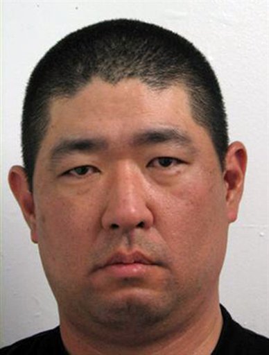 
 In this image released by the Montgomery County Police, James J. Lee is seen is a booking mugshot from 2008 on disorderly conduct. Lee, 43, a gunman with what police described as 'concerns' with the Discovery Channel networks took at least one person hostage in the company's Silver Spring, Md., headquarters Wednesday, Spet. 1, 2010. A law enforcement official speaking on condition of anonymity because the investigation is ongoing said authorities have identified Lee as the likely suspect. (AP Photo/Montgomery County (Md.) Police)
 