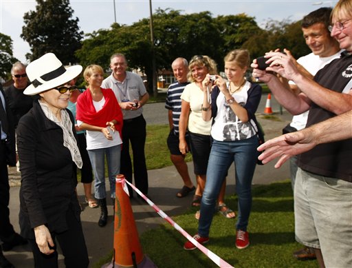 
 John Lennon's widow Yoko Ono, left, visits his old house in Menlove Avenue, Liverpool, England, Friday, Sept. 3, 2010. (AP Photo/Tim Hales)
 