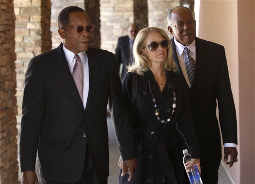 
 Rod Carew, left, with wife Rhonda Carew, and Tony Oliva, right, arrive for the funeral of baseball great Harmon Killebrew Friday, May 20, 2011, in Peoria, Ariz. Carew and Oliva were former teammates of Killebrew. (AP Photo/Ross D. Franklin)
 