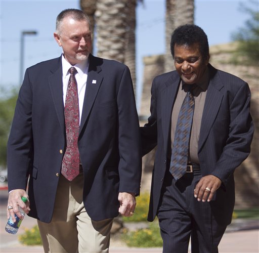 
 Hall of Famer and former Minnesota Twins' Bert Blyleven, left, and former major league baseball player and musician Charley Pride walk into Christ's Church of the Valley for former Twins' Harmon Killebrew's funeral, Friday, May 201, 2011, in Peoria, Ariz. Killebrew died Tuesday, May 17 of esophageal cancer. He was 74. (AP Photo/The Arizona Republic, David Wallace)
 