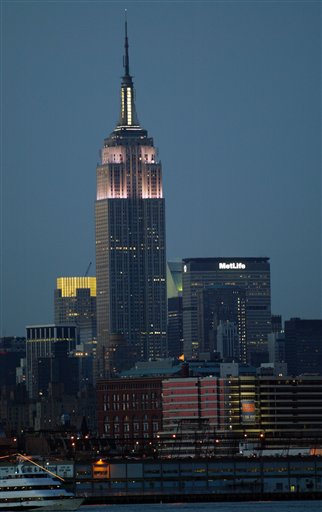 
 FILE - This June 26, 2004 file photo shows the Empire State Building in New York. Otis Elevator has won a contract to replace all 68 elevators in the iconic building with faster, more efficient lifts. It is the largest modernization project ever undertaken by the 158-year-old elevator company. (AP Photo/Stuart Ramson, File)
 