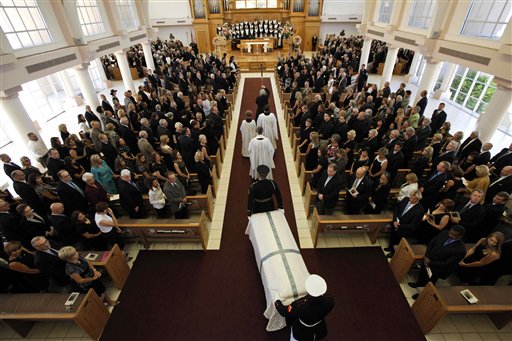 
 The casket bearing the body of former first lady Betty Ford is carried by members of the armed forces into St. Margaret's Episcopal Church Tuesday, July 12, 2011, in Palm Desert, Calif. (AP Photo/Jae C. Hong, Pool)
 