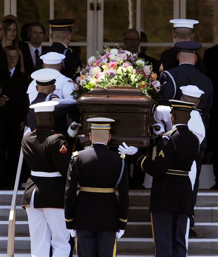 
 A military honor guard carries the casket of former first lady Betty Ford into her funeral at St. Margaret's Episcopal Church in Palm Desert, Calif., Tuesday, July 12, 2011. (AP Photo/Chris Pizzello)
 