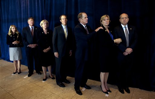 
 In this image released by the Gerald R. Ford Library and Museum, Julianne Ford, Jack Ford, Gayle Ford, Michael Ford, Steve Ford, Susan Ford Bales, and Vaden Bales wait to enter the Gerald R. Ford Presidential Museum for the arrival of the casket of former first lady Betty Ford, Wednesday, July 13, 2011, in Grand Rapids, Mich. (AP Photo/Gerald R. Ford Library and Museum, David Hume Kennerly)
 