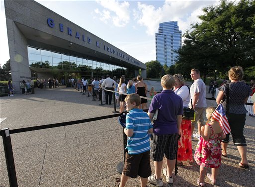 
 Members of the public wait in line to pay their respects to former first lady Betty Ford during the public viewing at Gerald R. Ford Presidential Museum Wednesday, July 13, 2011 in Grand Rapids, Mich. The former first lady will be buried at the museum on Thursday next to her husband former President Gerald R. Ford. (AP Photo/Paul Sancya)
 