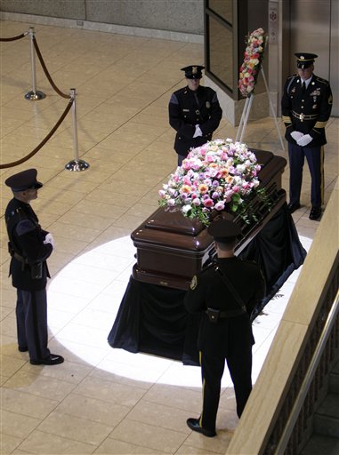 
 A military honor guard stands by the casket of former first lady Betty Ford during the public viewing at Gerald R. Ford Presidential Museum Wednesday, July 13, 2011 in Grand Rapids, Mich. The former first lady will be buried at the museum on Thursday next to her husband former President Gerald R. Ford. (AP Photo/Carlos Osorio)
 