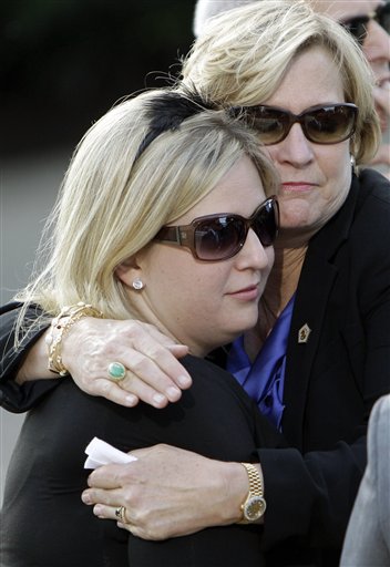 
 Susan Ford Bales hugs her daughter Heather Vance after the private visitation for former first lady Betty Ford at Gerald R. Ford Presidential Museum Wednesday, July 13, 2011 in Grand Rapids, Mich. The former first lady will be buried at the museum on Thursday next to her husband former President Gerald R. Ford. (AP Photo/Carlos Osorio)
 