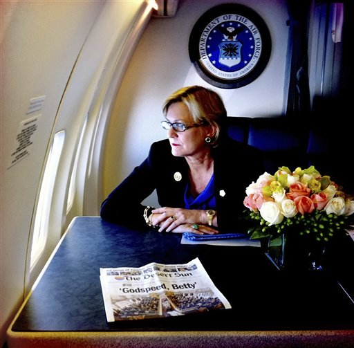 
 In this image released by the Gerald R. Ford Library and Museum, Susan Ford Bales, the only daughter of former first lady Betty Ford, looks out the window on the U.S. Air Force plane carrying her mother's body, Wednesday, July 13, 2011, from Palm Springs, Calif., to Grand Rapids, Mich. She and the other family members will be attending Ford's funeral and burial on Thursday. (AP Photo/Gerald R. Ford Library and Museum, David Hume Kennerly)
 