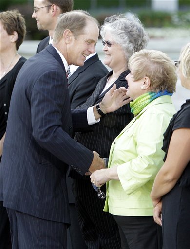 
 Steve Ford, left, thanks museum staff after the private visitation for former first lady Betty Ford at Gerald R. Ford Presidential Museum Wednesday, July 13, 2011, in Grand Rapids, Mich. The former first lady will be buried at the museum on Thursday next to her husband former President Gerald R. Ford. (AP Photo/Carlos Osorio)
 