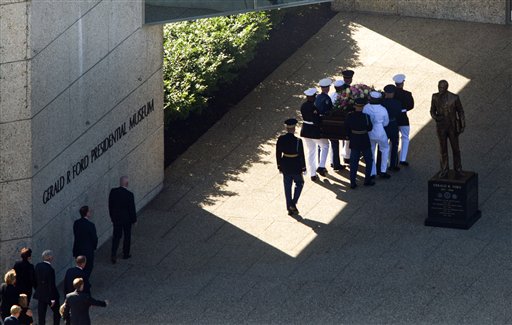 
 The casket of former first lady Betty Ford is carried by a military honor guard into the Gerald R. Ford Presidential Museum on Wednesday, July 13, 2011, in Grand Rapids Mich. (AP Photo/Adam Bird)
 