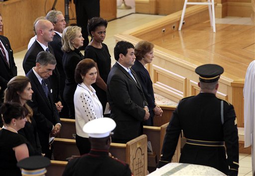 
 From top left, former President George W. Bush, Secretary of State Hillary Rodham Clinton, first lady Michelle Obama and former first lady Rosalynn Carter watch as members of the armed forces carry the coffin bearing the body of former first lady Betty Ford into St. Margaret's Episcopal Church Tuesday, July 12, 2011, in Palm Desert, Calif. (AP Photo/Jae C. Hong, Pool)
 