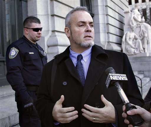 
 Reality TV star Richard Hatch, center, departs federal court in Providence, R.I., Monday, Jan. 10, 2011. In 2009, Hatch began a three-year period of supervised release under the condition that he refile and pay his taxes on the 'Survivor' winnings and other income. The court found Monday that he violated the terms of his supervised released. (AP Photo/Steven Senne)
 