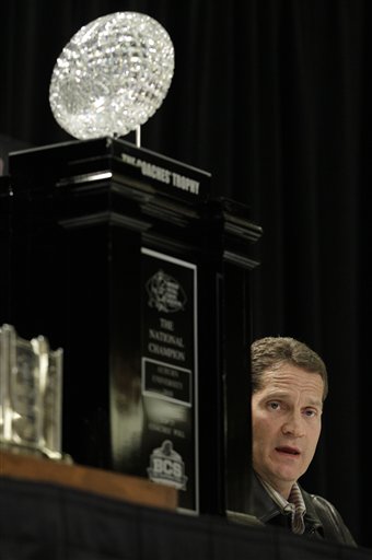 
 Auburn head coach Gene Chizik answers questions during a news conference after the BCS National Championship NCAA college football game Tuesday, Jan. 11, 2011, in Scottsdale, Ariz. Auburn beat Oregon 22-19 to capture the championship. (AP Photo/Charlie Riedel)
 
