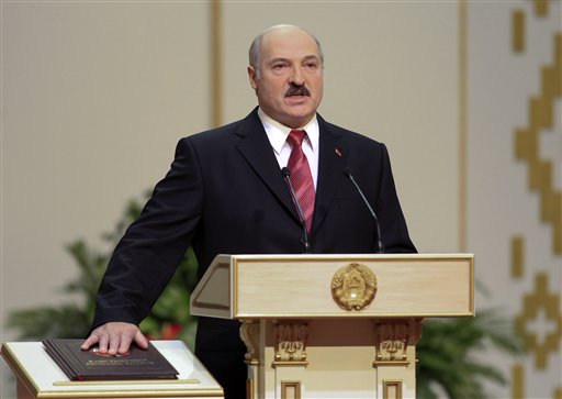 
 Belarus's President Alexander Lukashenko takes his oath of office during his inauguration ceremony in Minsk, Friday, Jan. 21, 2011. (AP Photo/Vasily Fedosenko, Pool)
 