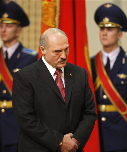 
 Belarusian President Alexander Lukashenko looks on during his inauguration ceremony at the Palace of the Republic in Minsk, Belarus, Friday, Jan. 21, 2011. Alexander Lukashenko was sworn in Friday for a fourth term. (AP Photo/Sergei Grits, Pool)
 