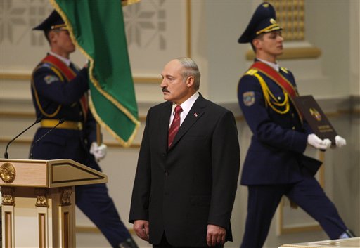 
 Belarusian President Alexander Lukashenko, center, is seen prior to his inauguration ceremony at the Palace of the Republic in Minsk, Belarus, Friday, Jan. 21, 2011. Alexander Lukashenko was sworn in Friday for a fourth term. (AP Photo/Sergei Grits, Pool)
 
