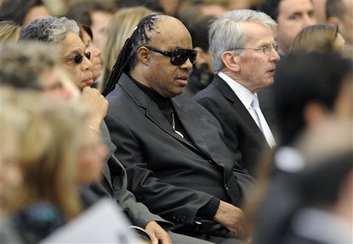 
 Singer and songwriter Stevie Wonder attends the funeral Mass for R. Sargent Shriver at Our Lady of Mercy Catholic church in Potomac, Md., outside Washington Saturday, Jan. 22, 2011. Shriver, an in-law of the Kennedys, and the first director of the Peace Corps, died Tuesday. He was 95. (AP Photo/Cliff Owen, Pool)
 