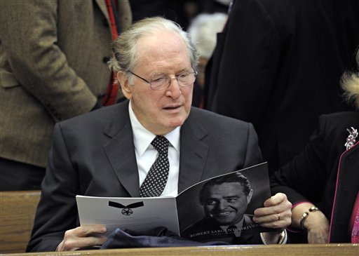 
 Sen. Jay Rockefeller, D-WV, looks at the program prior to the start of the funeral Mass for R. Sargent Shriver at Our Lady of Mercy church in Potomac, MD, Saturday, Jan. 22, 2011. Shriver, an in-law of the Kennedys, and the first director of the Peace Corps, died Tuesday. He was 95. (AP Photo/Cliff Owen,Pool)
 