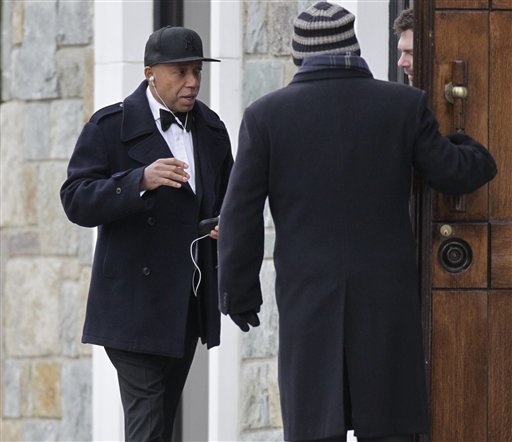 
 Hip Hop music pioneer Russell Simmons arrives for the funeral Mass of R. Sargent Shriver at Our Lady of Mercy Catholic church in Potomac, Md., just outside Washington, Saturday, Jan. 22, 2011. Shriver, the man responsible for launching the Peace Corps after marrying into the Kennedy family, died last Tuesday at age 95 after suffering from Alzheimer's disease for years. (AP Photo/J. Scott Applewhite)
 