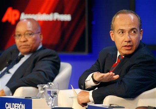 
 South Africa's President Jacob Zuma, left, and Mexico's President Felipe Calderon participate in a session on Climate Change at the World Economic Forum in Davos, Switzerland on Thursday, Jan. 27, 2011. Focus shifts on Thursday to the future of the euro and the issue of climate change. (AP Photo/Michel Euler)
 