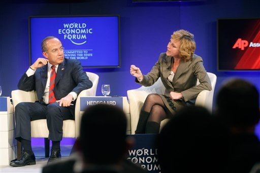 
 Mexico's President Felipe Calderon, left, and European Commissioner for Climate Action Connie Hedegaard participate in a session on Climate Change at the World Economic Forum in Davos, Switzerland on Thursday, Jan. 27, 2011. Focus shifts on Thursday to the future of the euro and the issue of climate change. (AP Photo/Michel Euler)
 