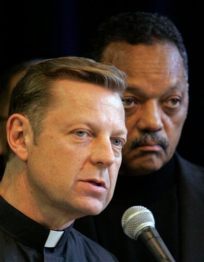 
 FILE - In this June 1, 2007 file photo, the Rev. Michael Pfleger, pastor of St. Sabina Church in Chicago, is seen with Rev. Jesse Jackson during a press conference at Rainbow/Push Coalition headquarters in Chicago. Pfleger was interviewed by The Associated Press on the challenges that will face Chicago's next mayor. The election is Feb. 22, 2011. (AP Photo/M. Spencer Green, File)
 