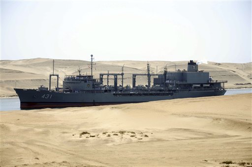 
 The Iranian navy's replenishment vessel IS Kharg passes through the Suez canal at Ismailia, Egypt, Tuesday, Feb.22, 2011. The Kharg accompanied by the frigate IS Alvand entered the Suez Canal on Tuesday en route to Syria, officials said, the first time in three decades that Tehran has sent military ships through the strategic waterway.(AP Photo)
 