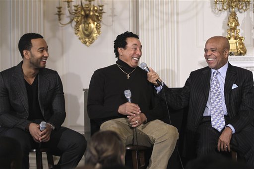 
 From left, singer John Legend, singer Smokey Robinson and Motown founder Berry Gordy Jr. hold a discussion hosted by First lady Michelle Obama for students, highlighting Motown artists, Thursday, Feb. 24, 2011, in the State Dining Room of the White House in Washington. (AP Photo/Charles Dharapak)
 