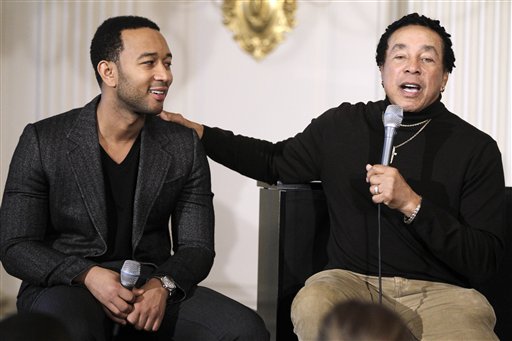 
 Singer Smokey Robinson, right, and John Legend talk at a music workshop for students, highlighting Motown artists hosted by Michelle Obama, Thursday, Feb. 24, 2011, in the State Dining Room of the White House in Washington. (AP Photo/Charles Dharapak)
 
