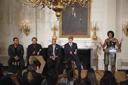 
 First lady Michelle Obama holds a music discussion for students, highlighting Motown artists in the State Dining Room of the White House in Washington, Thursday, Feb. 24, 2011. From left are: singer John Legend; singer Smokey Robinson; Motown founder Berry Gordy Jr.; Grammy Museum Executive Director Bob Santelli. (AP Photo/Charles Dharapak)
 
