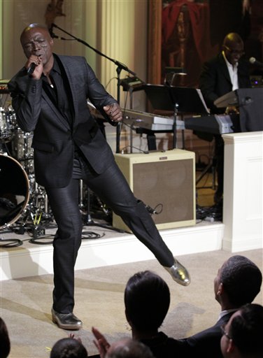 
 Singer Seal performs on stage while President Barack Obama and first lady Michelle Obama watch during the White House Music Series saluting Motown in the East Room of the White House in Washington, Thursday, Feb. 24, 2011. (AP Photo/Pablo Martinez Monsivais)
 