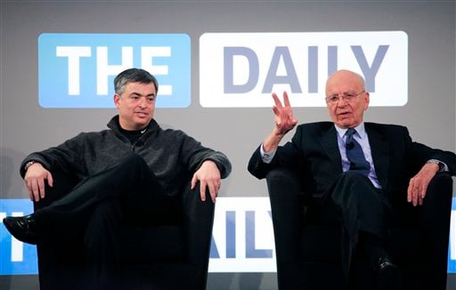 
 Rupert Murdoch, right, Chairman and CEO of News Corporation, and Eddy Cue, vice president of Apple, attend the launch of The Daily, Wednesday, Feb. 2, 2011 in New York. The Daily is the world's first iPad-only newspaper. (AP Photo/Mark Lennihan)
 