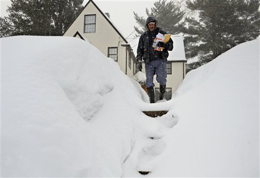 
 Mailman Don Jacques delivers the mail during a winter storm in Hartford, Conn., Tuesday, Feb. 1, 2011. (AP Photo/Jessica Hill)
 